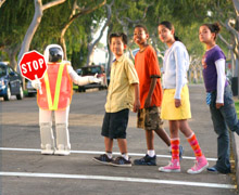 ASIMO helping children cross the road